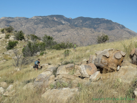 Hiking past interesting granite boulders.
