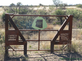 A very fancy gate marks the entrance of the AZT into Oracle State Park.